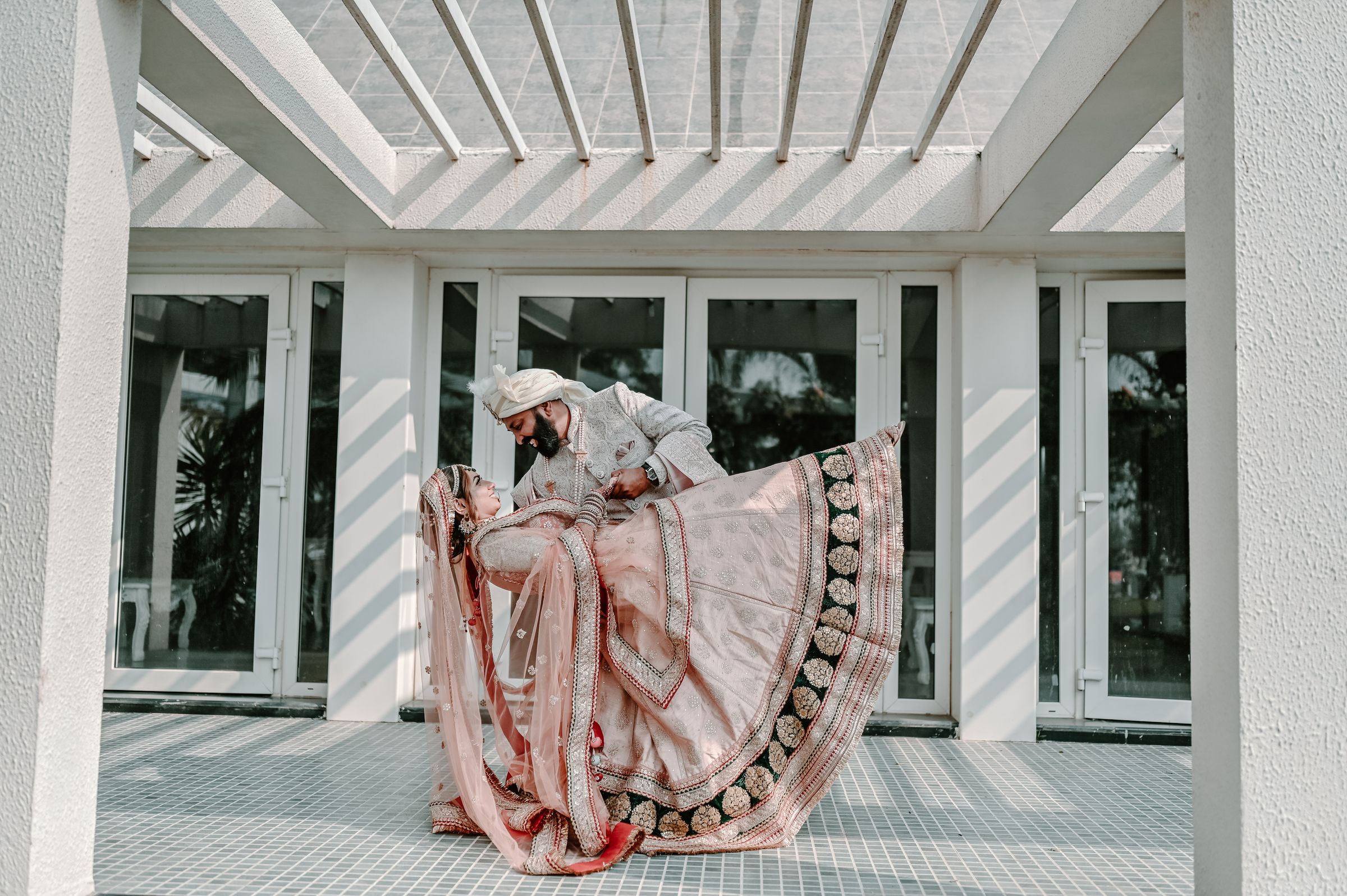 Intimate portrait of couple in heritage courtyard