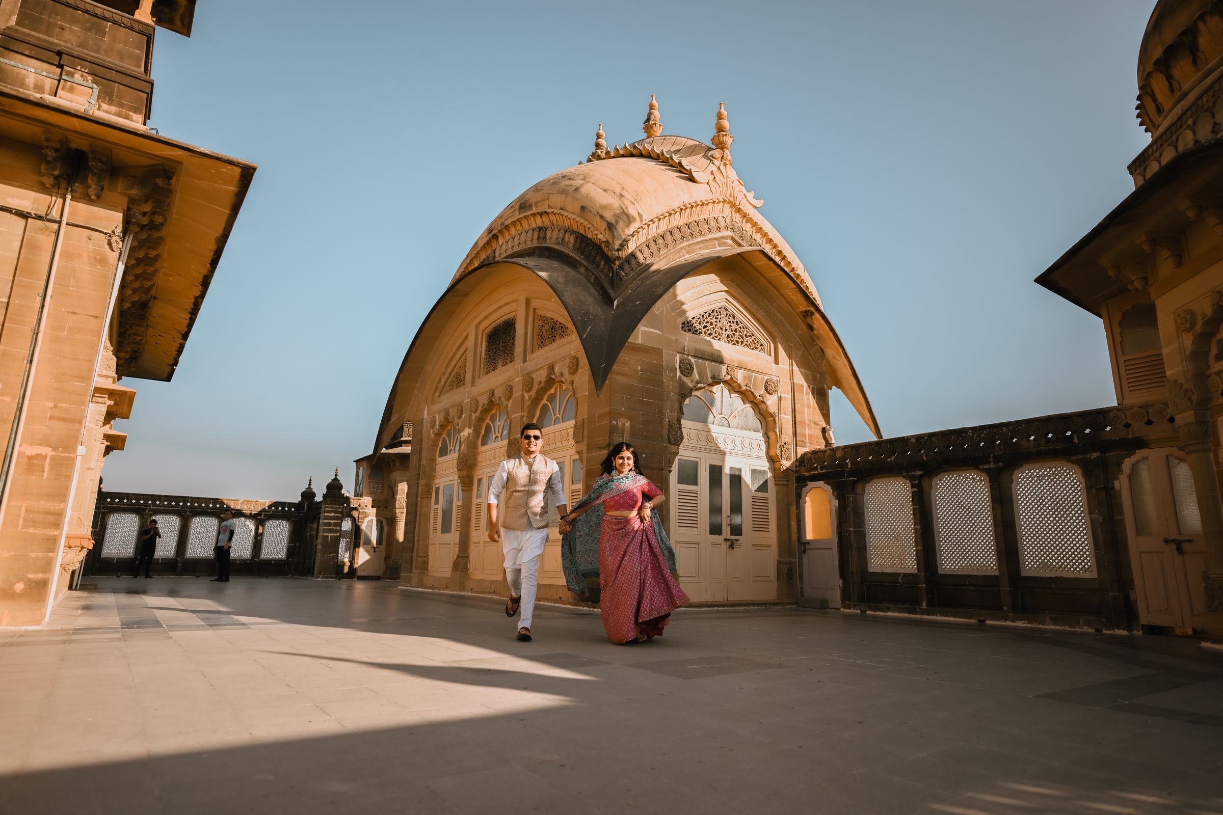 Bride and groom exchanging garlands during traditional ceremony